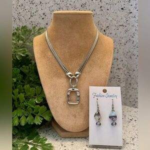 Lia Sophia silver tone wavy design necklace set